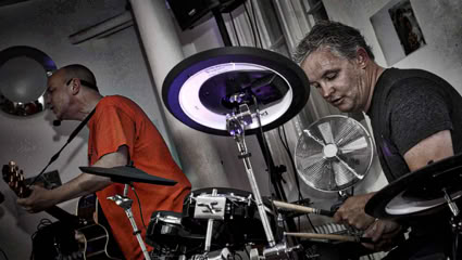 Bash and Strum playing a charity Gig