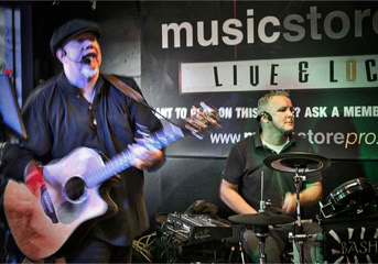 Ginger Geoffrey playing as Bash and Strum at Hanley Music Stoke with Daz Clement on drums and backing vocals.